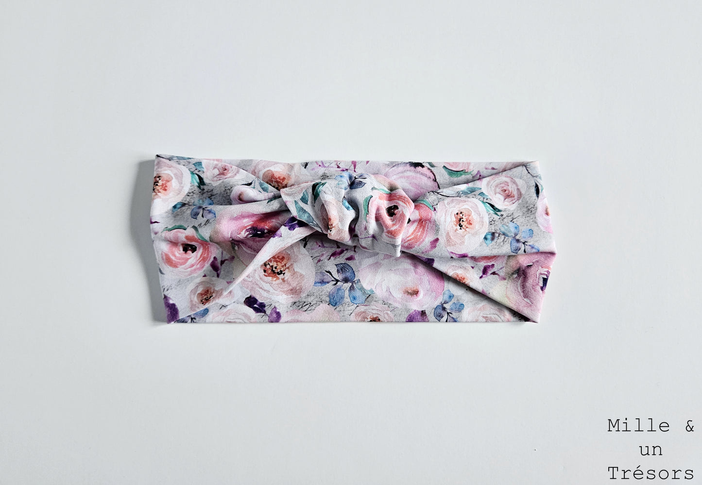 Bandeau à cheveux noué fleuri rose