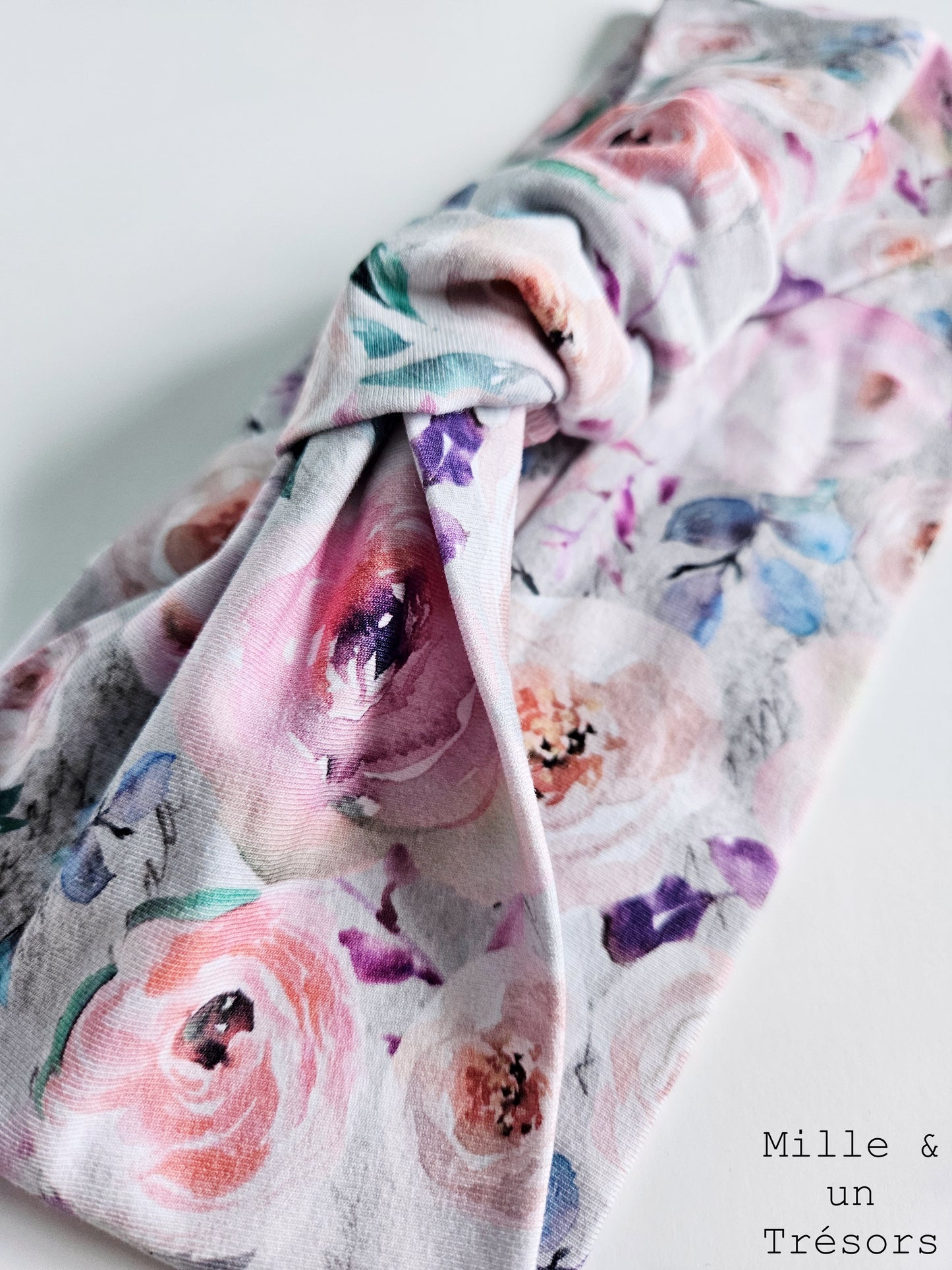 Bandeau à cheveux noué fleuri rose